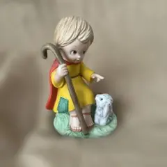 子供とウサギの陶器フィギュアのサムネイル