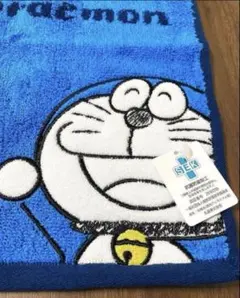 ★可愛いドラえもんアップが印象的なハンドタオル★SEKタグ付き★約30×30cm