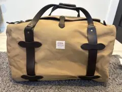 未使用 FILSON ラギットツイルダッフルバッグ Medium - メルカリ