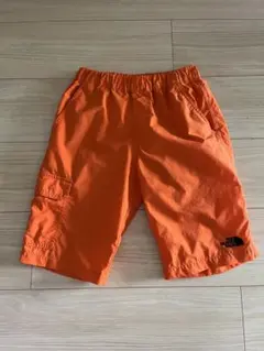 The North Face オレンジカーゴショートパンツ