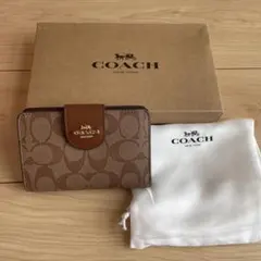 COACH 二つ折り財布 ベージュ