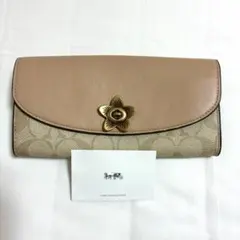 れ*い様 【訳あり】新品未使用 Coach フラワーモチーフ 長財布 ベージュ