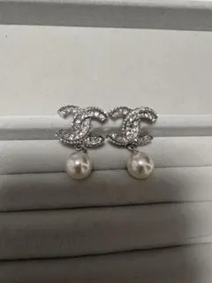 ccロゴピアス シルバー - メルカリ