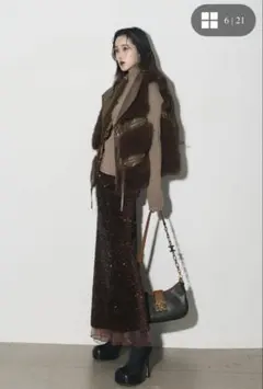 andrea&co. フェイクファーライダースベスト スパンコールスカート
