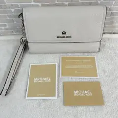 【MICHAEL KORS】三つ折り長財布 クラッチバッグタイプ スマホ収納可