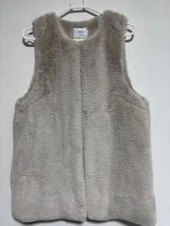 Discoat フェイクファーベスト ベージュ