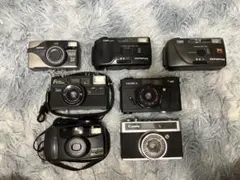 Nikon olympus.他6種　カメラ7台セット まとめ売り ジャンクのサムネイル