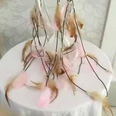 ピンクとブラウンの羽根ヘッドドレス