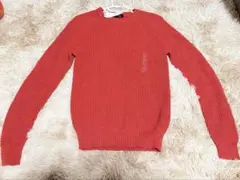 ユニクロのオレンジニットセーター（Sサイズ）