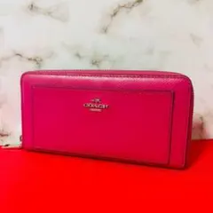 0120 COACH ピンク 内面シグネチャー ラウンドファスナー 長財布のサムネイル