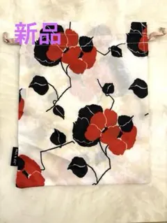 PAUL & JOEとVOCEのコラボグッズ　赤と黒の花柄が特徴的な巾着袋のサムネイル