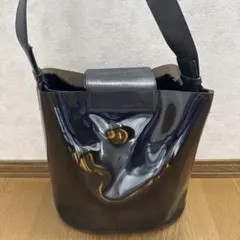 Salvatore Ferragamo 巾着型 リュック レザー×ラタン - メルカリ