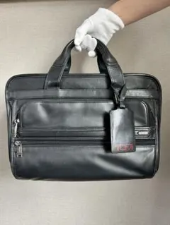 TUMI レザービジネスバッグ - メルカリ