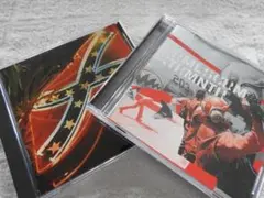 プライマル・スクリーム／ギヴ・アウト・バット・ドント・キヴ・アップ、エクスターミ