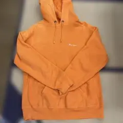 Champion オレンジ フード付きパーカー