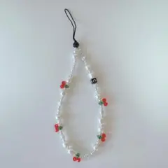 casetifyのスマホストラップ チェリー