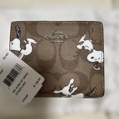 COACH スヌーピー柄 二つ折り財布 - メルカリ