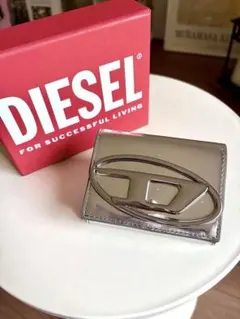新品【DIESEL】シルバー三つ折り財布 箱付き 2026年最新】DIESEL レディース 三つ折り財布の人気アイテム - メルカリ