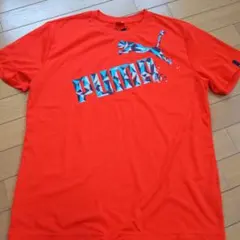 PUMA Tシャツ オレンジ グラフィックロゴ　メンズO（XL）サイズのサムネイル