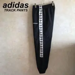 古着 美品 アディダス トレフォイルテープロゴ ナイロントラックパンツ 黒 M