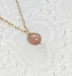 サンストーンのネックレス　ゴールド　天然石　ペンダント　ワイヤー　スター効果