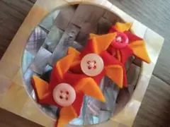 ハンドメイド　風車バレッタ 赤オレンジ