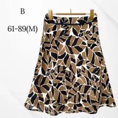 b Aラインスカート　膝丈　フレア　総柄　ベージュ　ブラック　サラサラ　夏　M