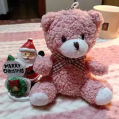 ピンクのリボン付き小型ぬいぐるみ