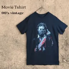 ホラーTシャツ ムービーT 公式 悪魔のいけにえ レザーフェイス ブラック 古着のサムネイル
