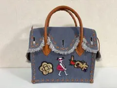 グレースコンチネンタル デニム カービングバッグ ワッペン付き