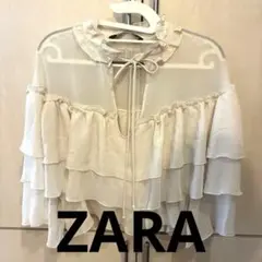 週末値下げ‼️ZARA フリル付きベージュトップスMのサムネイル