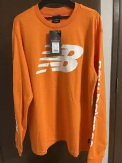 ⭐︎新品⭐︎New Balance 長袖シャツ　オレンジ Mサイズのサムネイル