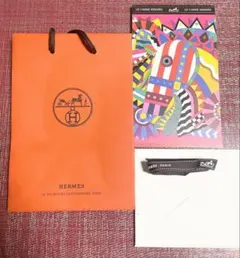 HERMES オレンジショップ袋とカード.リボン