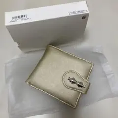 二つ折り財布 ゴールド 魚モチーフ留め具のサムネイル