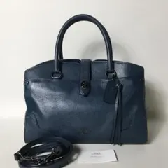 2025年最新】コーチ 紺 バッグの人気アイテム - メルカリ