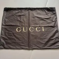 GUCCI 布袋 黒 ゴールドロゴ　グッチバッグ