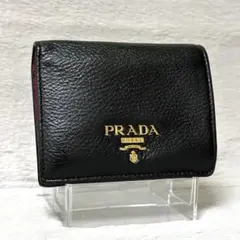 RFID搭載/美品✨プラダ 二つ折り財布 レザー シボ革 ゴールド金具 黒