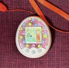 たまごっちみくす本体ピンク色　（紐付き）のサムネイル