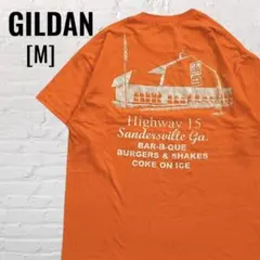 [US古着]GILDAN DAIRY LANE ショップTシャツ オレンジ Mのサムネイル