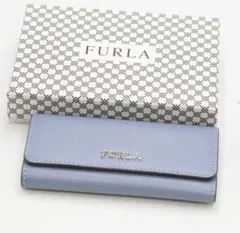 箱付き未使用美品フルラFURLA キーケース ライトブルーのサムネイル