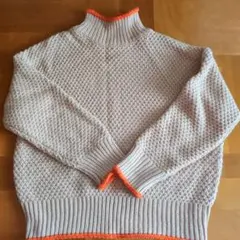 ベージュオレンジ配色ハイネックセーター