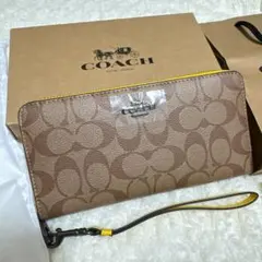 土日限定⭐️値下げ新品 COACHコーチ スヌーピー シグネチャー柄