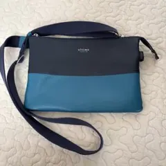 ultima ショルダーバッグ ブラック／ターコイズ