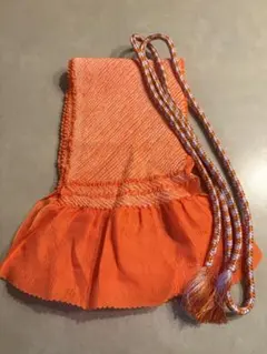 オレンジ色の伝統的な帯締め