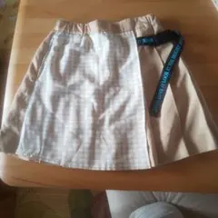 JENNIベージュ チェック柄 プリーツスカート ロゴ入りベルト付き