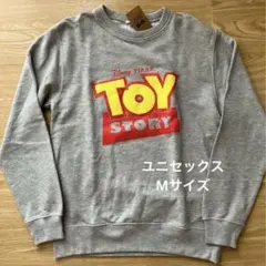 新品タグ付ディズニーピクサートイストーリーロゴトレーナースウェットユニセックスM