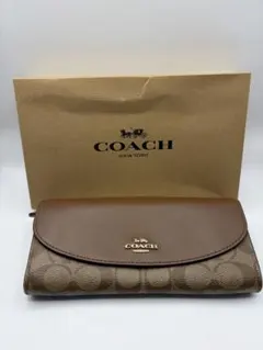 コーチ Coach 長財布 シグネチャー かぶせ フラップ 箱付き 茶のサムネイル