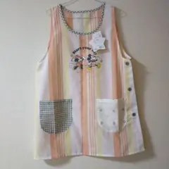 新品未使用タグ付✨️ミッキーミニーエプロン MLサイズ