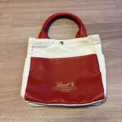 Lindt 赤と白のトートバッグ　未使用のサムネイル