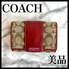 コーチ　財布 ニつ折り財布 シグネチャー キャンバス　レザー 小銭入れ　赤